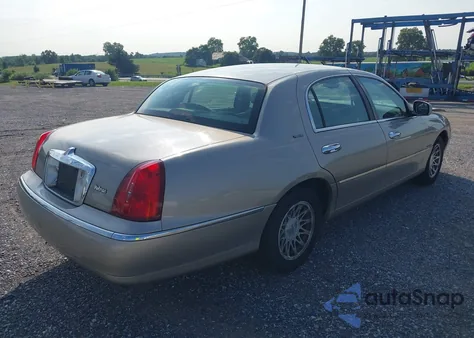 2000 Lincoln Town Car Signature из США, поврежденный, VIN 1LNHM82W9YY937526